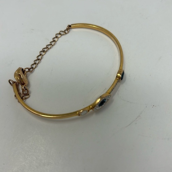 Bracelet with golden water eye with blue and white stone - Picture 2 of 5